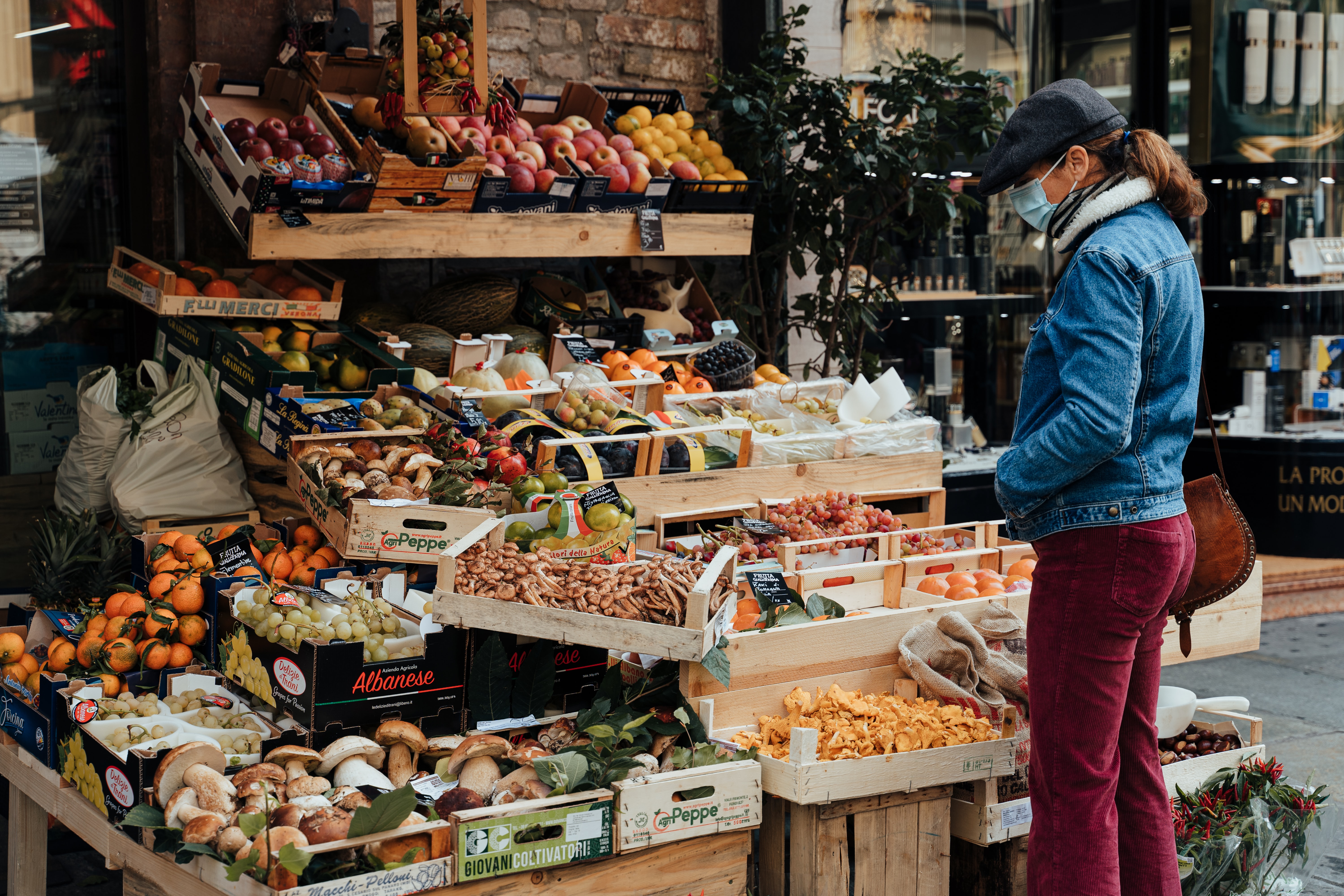 Consumer checking out a sustainable food stand.