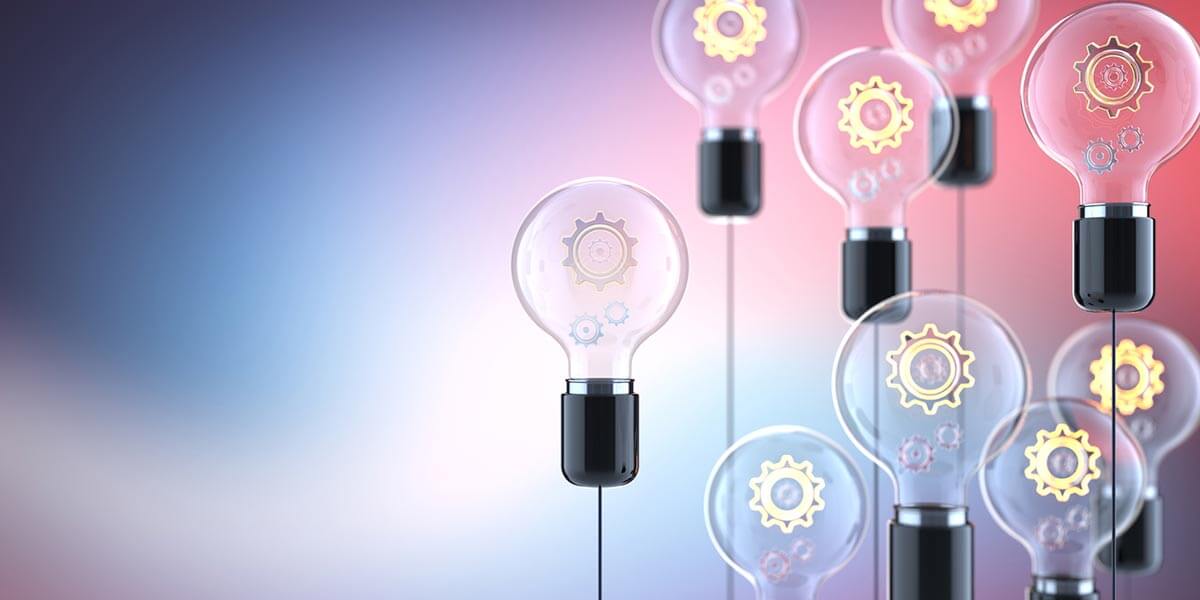 Lightbulbs with open innovation concepts inside 
